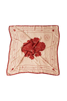 Señorita Luisa scarf in vibrant red, soft fabric with elegant drape, perfect for adding a stylish touch to any outfit.