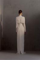White Jacqueline gown by White Plan featuring elegant fabric and a flowing silhouette for formal occasions.
