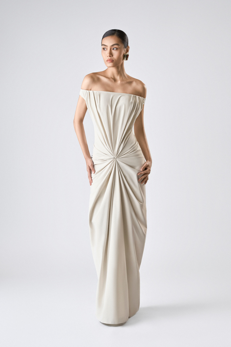 Ivory TONYY maxi dress with flowing fabric and sleeveless design, perfect for elegant summer or formal occasions.
