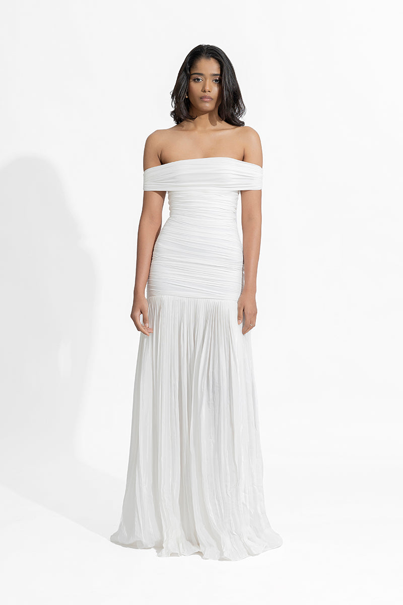 Deme By Gabriella Maria White Maxi Dress with flowing fabric and elegant design, perfect for summer or special occasions.