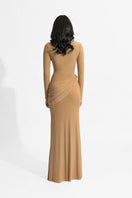 Deme By Gabriella Olga Tan Maxi Dress displayed on a hanger, showcasing its flowing fabric and elegant design.