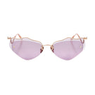 Moy Atelier LILLA Forget Me Not sunglasses with round frames and tinted lenses, stylish eyewear for sun protection.