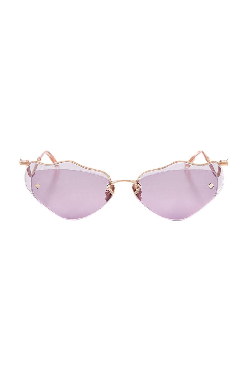 Moy Atelier LILLA Forget Me Not sunglasses with round frames and tinted lenses, stylish eyewear for sun protection.