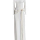 White Corvina draped floor-length gown by Maison Des Copains, elegant formal dress with flowing fabric and sophisticated style.