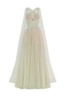 Joséphine Lyra mint gown, elegant formal dress with flowing fabric and intricate details, suitable for special occasions.