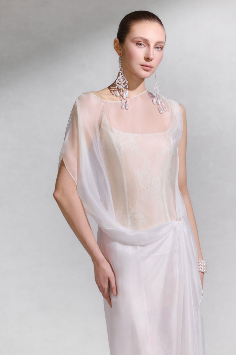 Arti Apparel Bellona midi dress with a flowing fabric and elegant design, perfect for stylish occasions.
