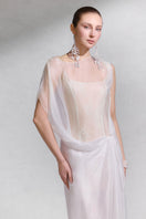 Elegant Bellona gown by Arti Apparel featuring flowing fabric and intricate detailing, perfect for formal occasions.
