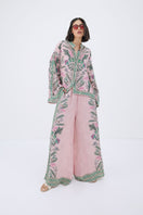 Raishma Ariyah shirt displayed on a hanger, featuring stylish fabric and design details for a fashionable women's shirt.