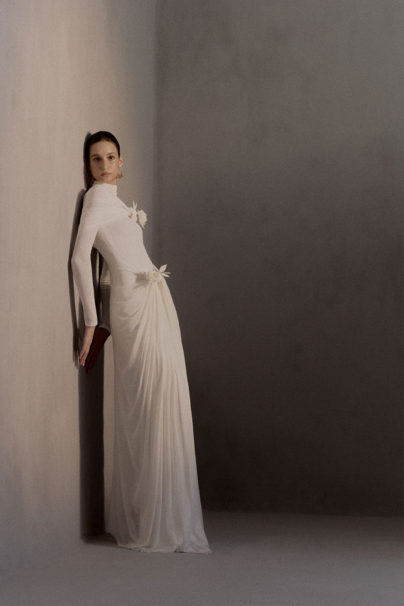 White Plan Jacqueline gown featuring elegant fabric and detailed design, perfect for formal occasions and evening wear.