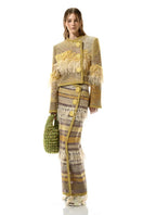 Lalo Avril gold jacket, stylish women's outerwear with a shiny gold finish, shown on a hanger against a plain background.