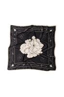 Señorita black Luisa scarf with soft fabric, stylish accessory for outfits, shown draped neatly on a flat surface.