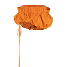 Le Thanh Hoa taffeta mini skirt featuring a sleek, shiny fabric and stylish design, perfect for fashionable everyday wear.