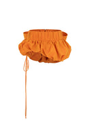 Le Thanh Hoa taffeta mini skirt featuring a sleek, shiny fabric and stylish design, perfect for fashionable everyday wear.