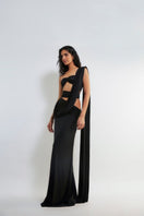 Deme By Gabriella Inga black cut-out maxi dress with stylish side cut-outs, flowing fabric, and elegant design perfect for formal occasions.