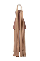 Brown strapless gown with an elegant cape by HACCHIC COUTURE, shown on a model, highlighting the flowing fabric and sophisticated design.