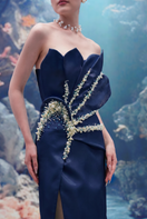 Dark navy Sirena water silk taffeta gown by 21Six, showing elegant flowing fabric and sophisticated design.