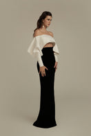 EVELORA black and white gown by POEM, elegant evening dress with flowing fabric and stylish design.