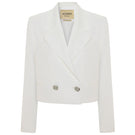 White Ancient Crop Blazer by Acaria Studio, stylish jacket with tailored fit and modern design, displayed on a hanger.