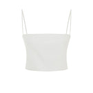 White Ancient Top by Acaria Studio, lightweight women's blouse with intricate design and relaxed fit, shown on a model.