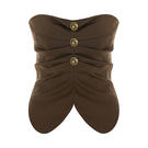 Acaria Studio brown GURU top with long sleeves and a relaxed fit, displayed on a hanger against a neutral background.