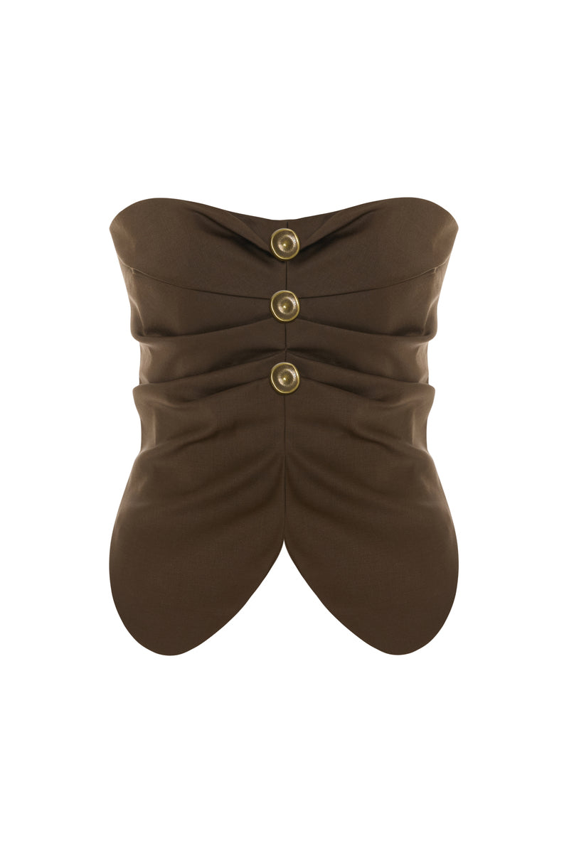 Acaria Studio brown GURU top with long sleeves and a relaxed fit, displayed on a hanger against a neutral background.