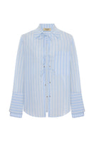Blue striped Sicilia linen shirt by Acaria Studio, shown with its lightweight, breathable fabric and classic collar design.
