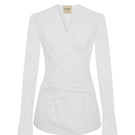 White Journey shirt by Acaria Studio, front view showcasing classic design and soft fabric texture.