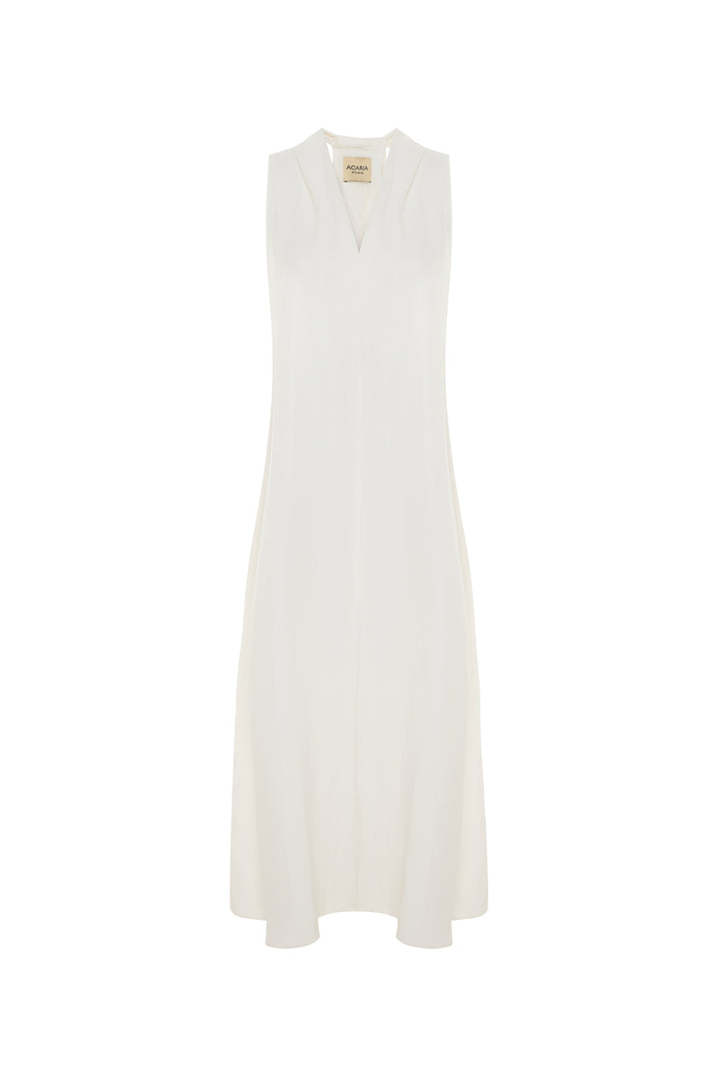 White Acaria Studio La Plage maxi dress featuring flowing fabric and a relaxed beach-inspired style.