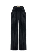 Black and white striped harem pants from Acaria Studio featuring a relaxed fit and comfortable design.