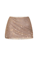 Gold mesh mini skirt by CEM featuring a fitted design and stylish shimmering fabric, perfect for trendy fashion looks.