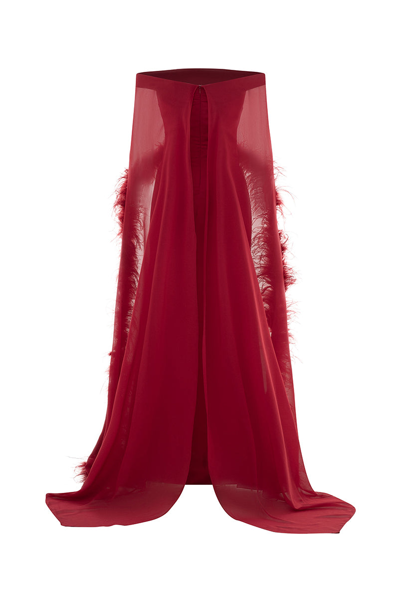 Red Valenciani ostrich feather trim cape gown featuring flowing fabric and elegant feather detailing.