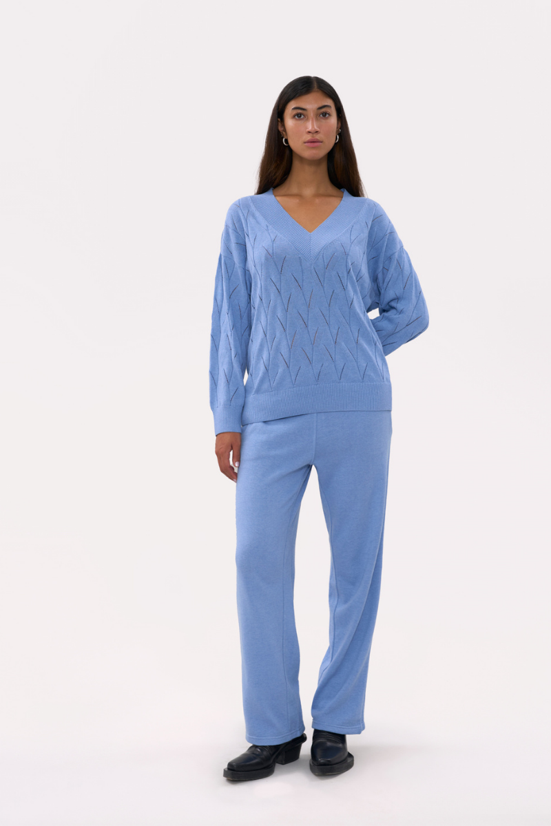 Light blue oversized V-neck jumper sweater by La Granni, featuring a relaxed fit and soft knit fabric.