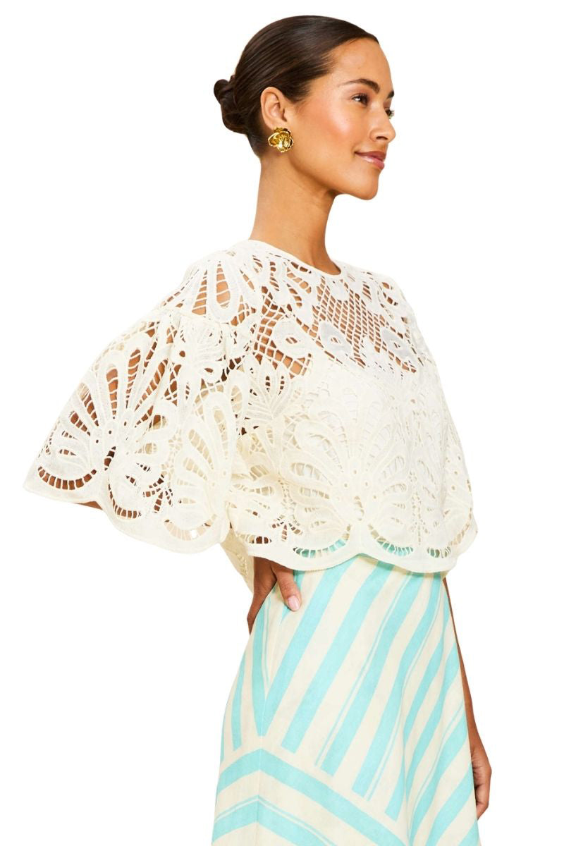 Mestiza New York Marianna lace top in ivory, featuring delicate lace fabric and feminine design, styled as a fashionable women's top.