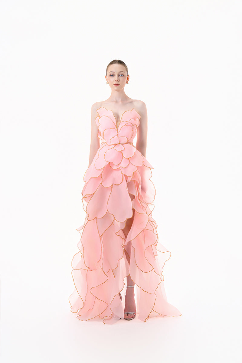 Elegant blooming blush rose tiered gown by Happy Clothing, featuring flowing fabric and layered design for a graceful look.
