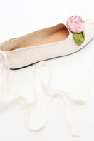 Chictopia satin rose flats in ivory with a delicate bow detail, perfect for elegant casual wear.