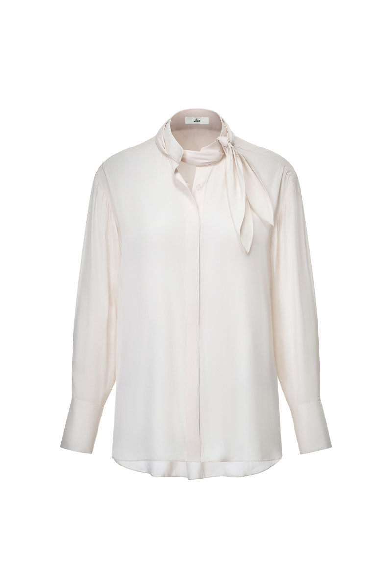 Ivory satin twilly shirt by Lecia featuring a silky, smooth fabric and stylish design, shown on a model.