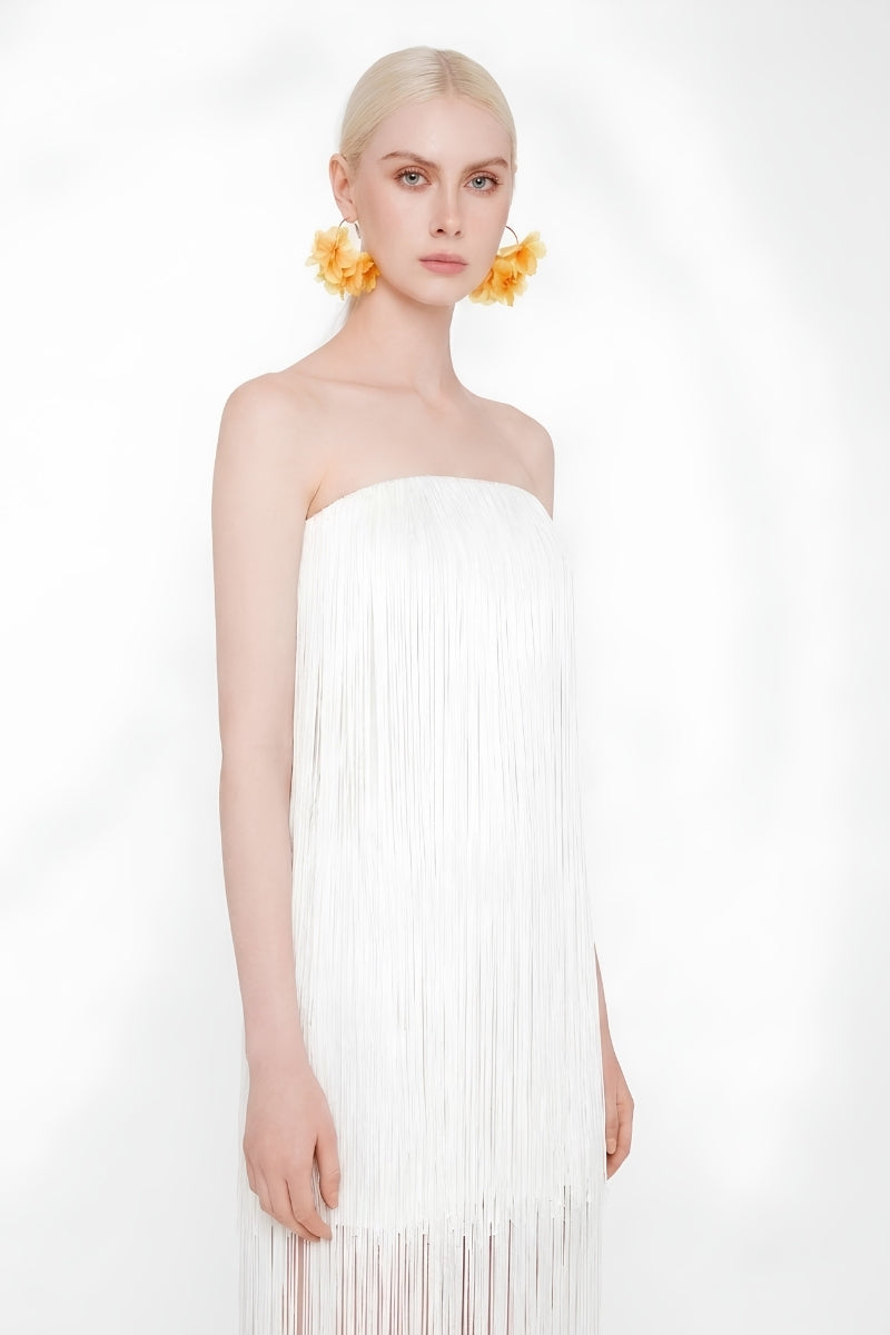 White Valenciani all-over fringe midi dress featuring flowing fabric and stylish fringe detailing, perfect for elegant occasions.