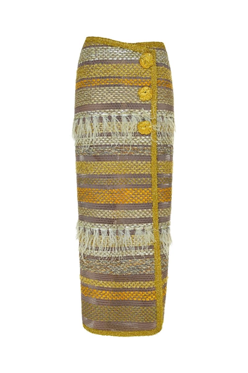 Lalo Avril maxi skirt in gold with flowing fabric and elegant design, showcased on a hanger against a neutral background.