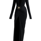 Deme By Gabriella Aldona black maxi dress with flowing fabric and sleeveless design, perfect for elegant occasions.