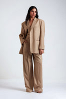 Deme by Gabriella Masha Desert Tan three-piece co-ord suit set with matching top, trousers, and blazer, styled for a sophisticated look.