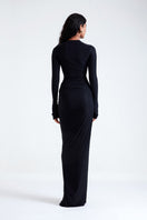 Black ALDONA maxi dress by Deme By Gabriella, flowing fabric with elegant design, displayed on a hanger.