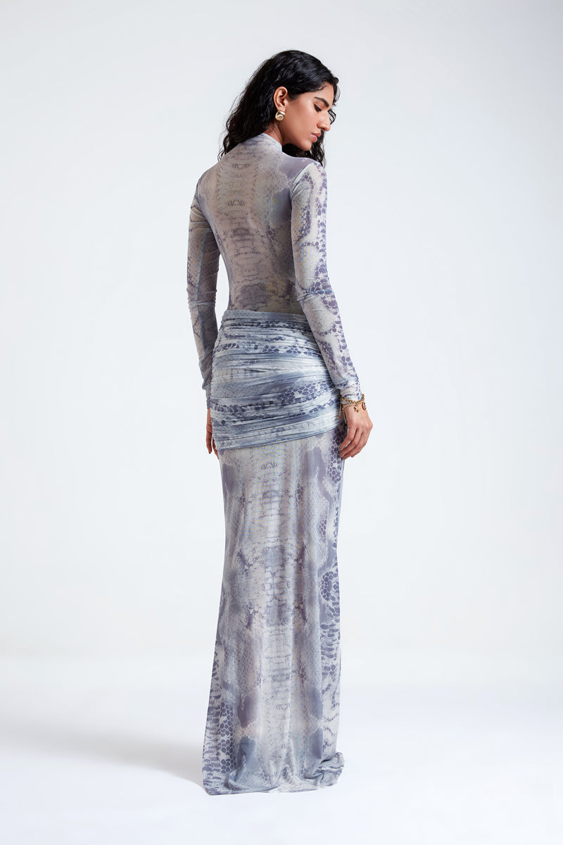 Deme By Gabriella Andrea Gray Maxi Dress featuring a flowing silhouette and elegant design, perfect for casual or formal occasions.