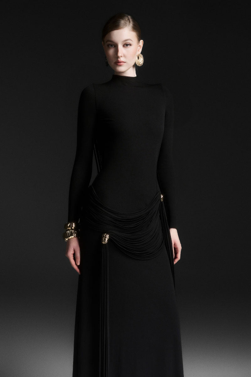 Black Maison Des Copains MIRÉA high neck floor-length maxi dress displayed on a model. Elegant and flowing design.