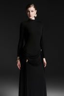 Maison Des Copains black high neck floor-length gown with elegant fit and flowing fabric, perfect for formal occasions.