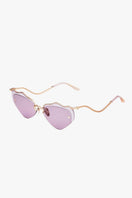 Moy Atelier LILLA Forget Me Not sunglasses with round frames and tinted lenses, stylish eyewear for sun protection and fashion.