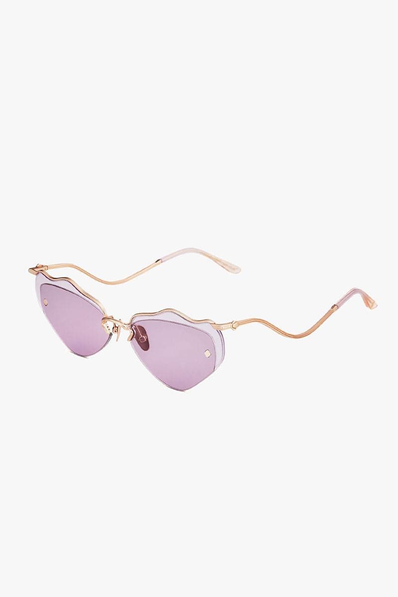 Moy Atelier LILLA Forget Me Not sunglasses with round frames and tinted lenses, stylish eyewear for sun protection and fashion.