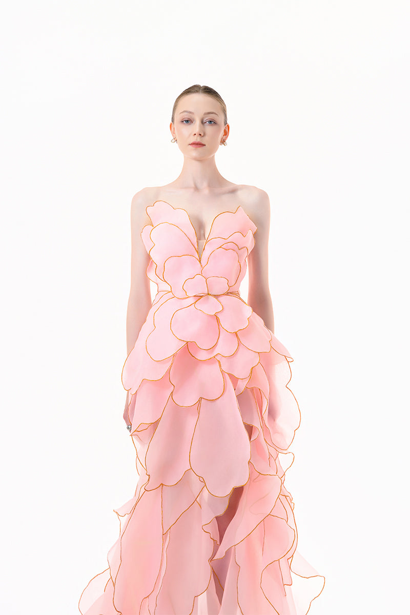 Elegant blooming blush rose tiered gown by Happy Clothing featuring flowing fabric and floral details for special occasions.
