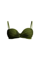 Andrea Iyamah Makena fringe bikini top in olive green with fringe details and adjustable straps, styled on a model.