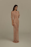 Poem Vespera nude pink gown with flowing fabric and elegant design, displayed on a dress form.
