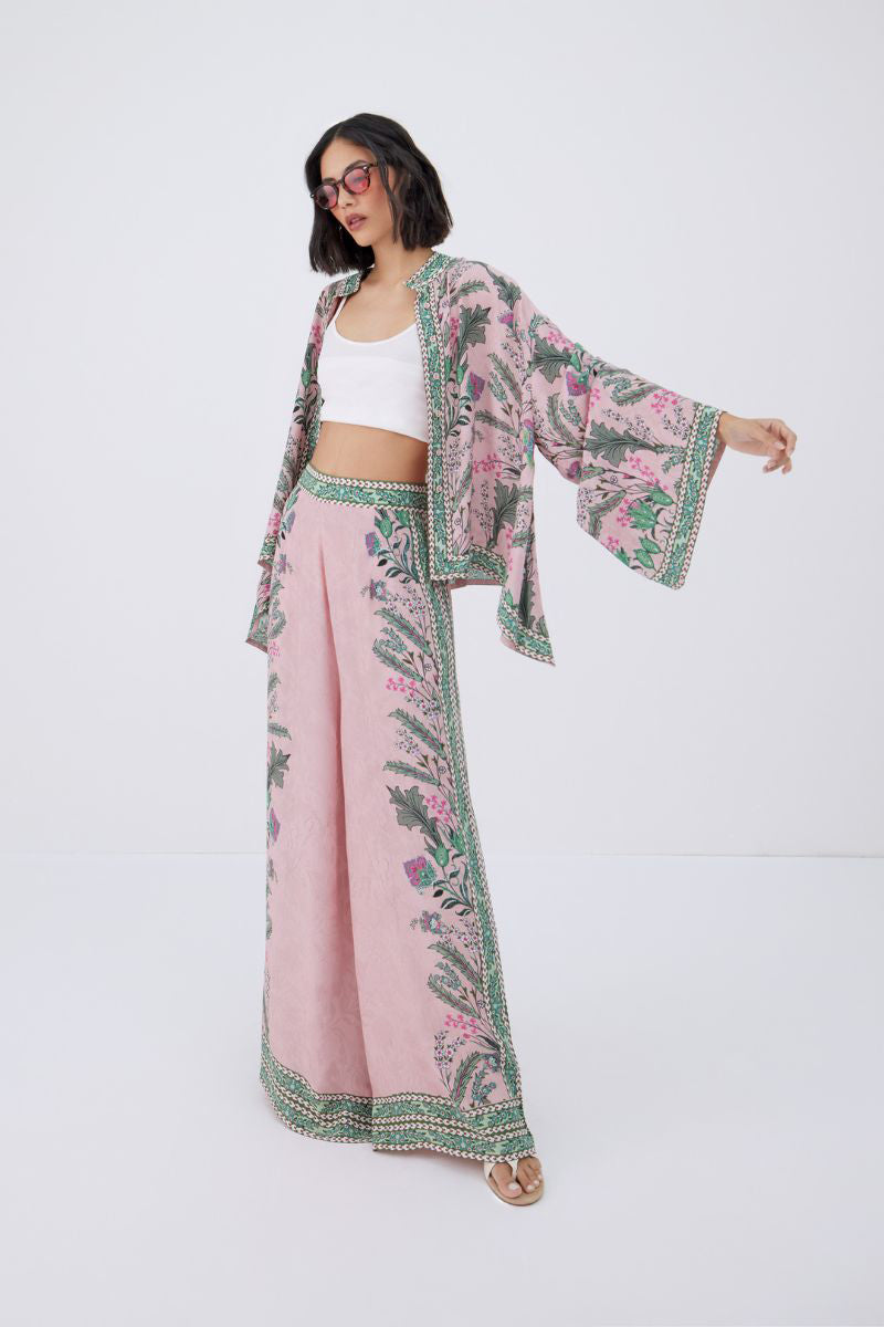 Raishma Ariyah shirt, stylish women's shirt with a modern design, displayed on a hanger against a neutral background.